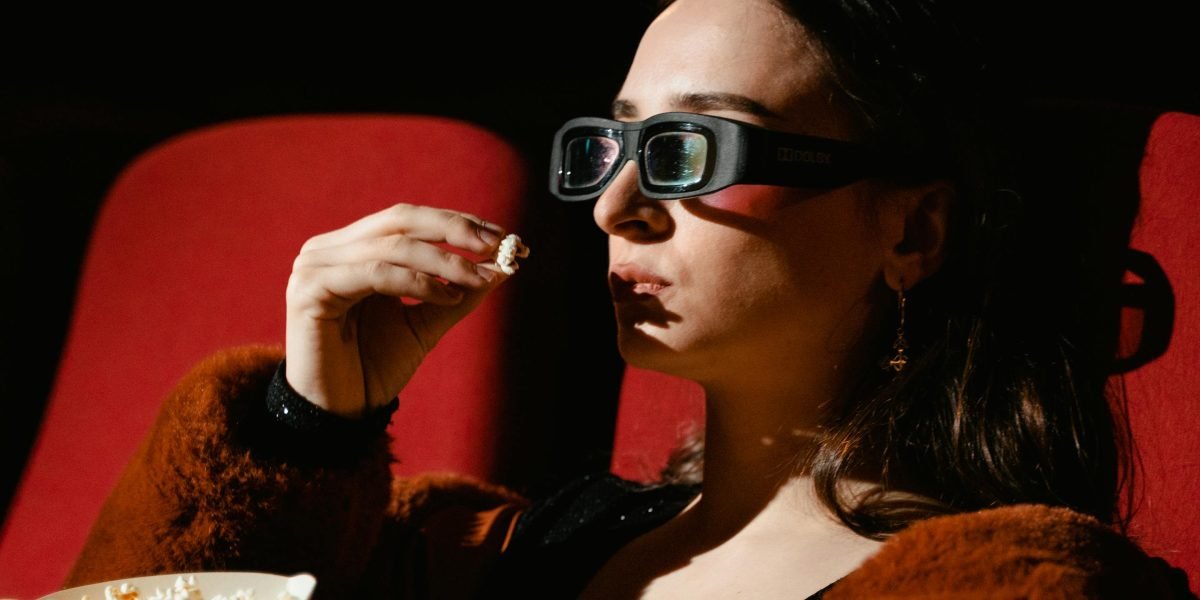 A person deeply engrossed in thoughtful storytelling, mirroring the appreciation for "Drive's" nuanced narrative.