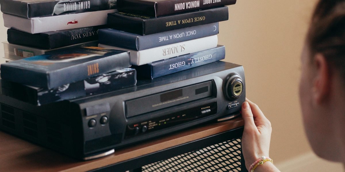 A person feeling overwhelmed by too many streaming options, searching for the right movie.